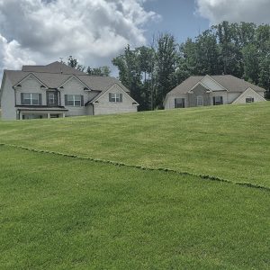 Precision lawn mowing with sharp edges in Flowery Branch, GA