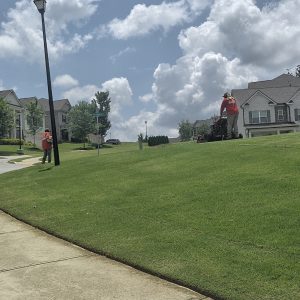 Professional lawn mowing crew at work in Buford Georgia